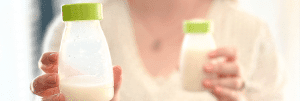 expressed breast milk in Ardo storage bottle