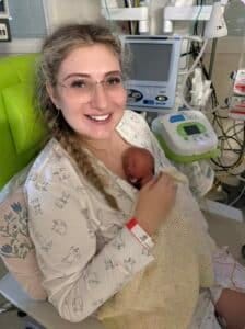 Lauren with her premature baby in hospital, with Ardo hospital grade breast pump to her side
