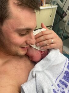 Father and baby having skin-to-skin time in hospital