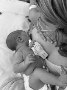 Megan breastfeeding daughter in NICU